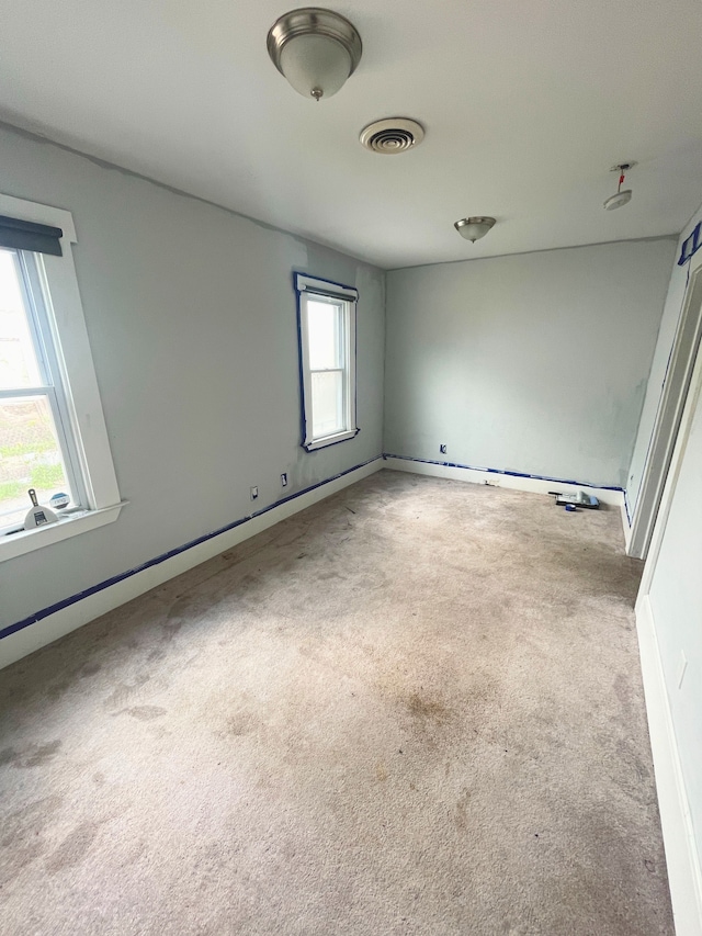 1714 Woodland St, Hamtramck, MI 48212 - unfurnished room with carpet flooring and baseboards