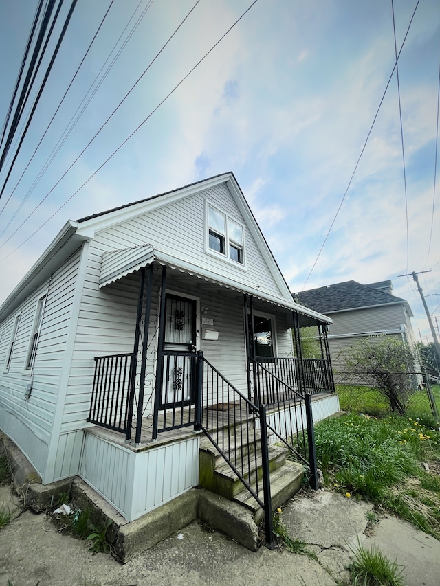 1714 Woodland St, Hamtramck, MI 48212 - view of front of home with a porch
