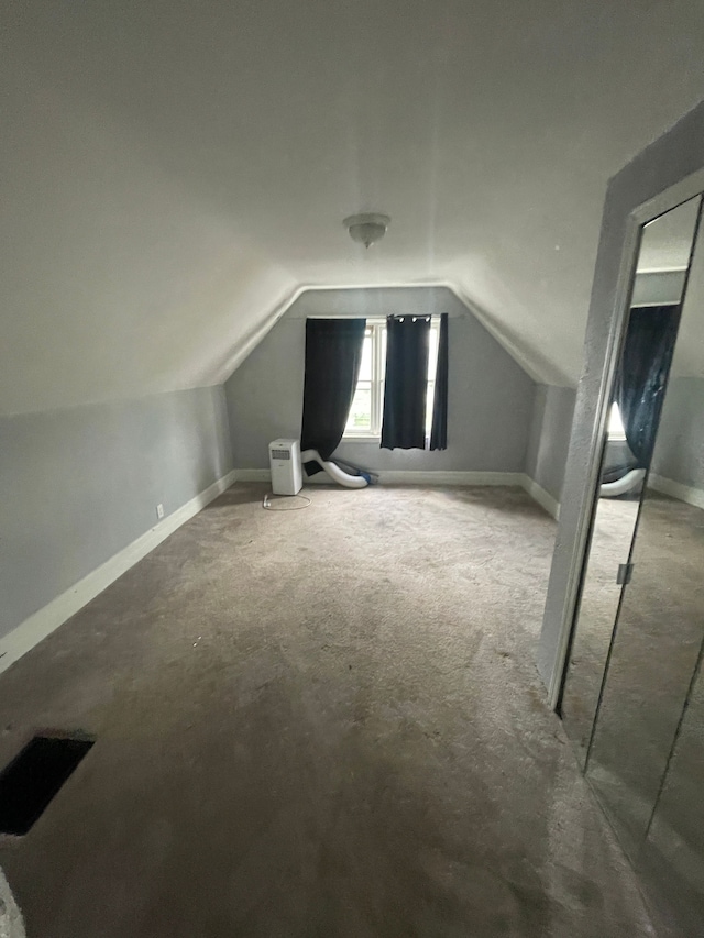 1714 Woodland St, Hamtramck, MI 48212 - additional living space featuring lofted ceiling, carpet, and baseboards