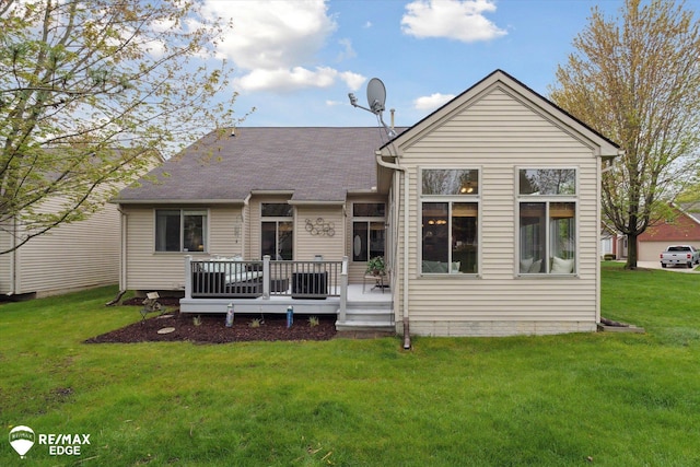 4433 Sunset Blvd, Grand Blanc, MI 48439 - rear view of property with a wooden deck, a yard, and roof with shingles