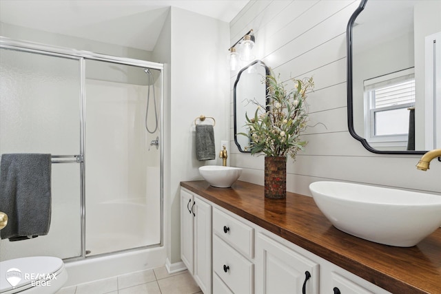 4433 Sunset Blvd, Grand Blanc, MI 48439 - bathroom with tile patterned flooring, a shower stall, and double vanity