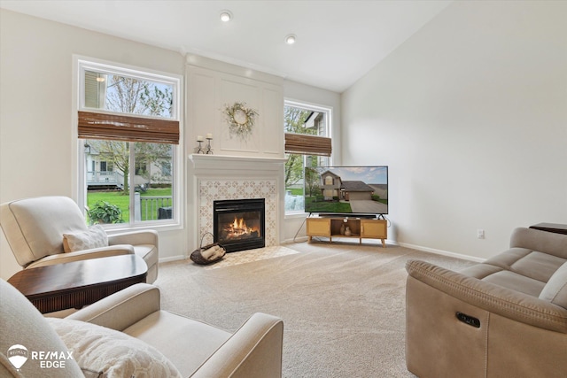 4433 Sunset Blvd, Grand Blanc, MI 48439 - carpeted living area featuring a fireplace, baseboards, plenty of natural light, high vaulted ceiling, and recessed lighting