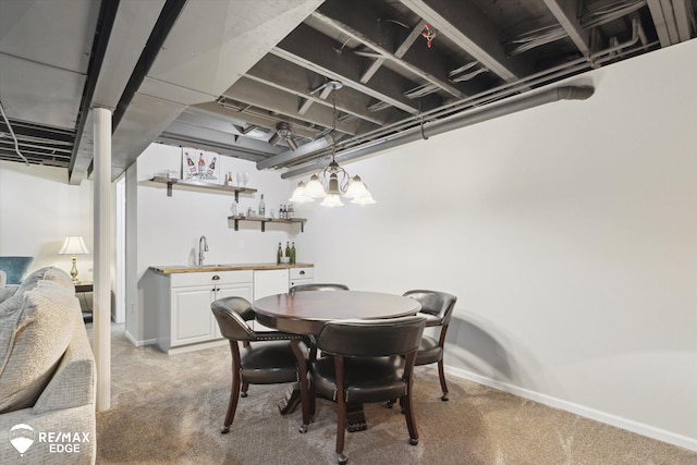 4433 Sunset Blvd, Grand Blanc, MI 48439 - dining room featuring light colored carpet, wet bar, and baseboards