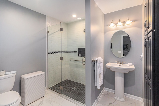 bathroom with marble finish flooring, toilet, a stall shower, and recessed lighting