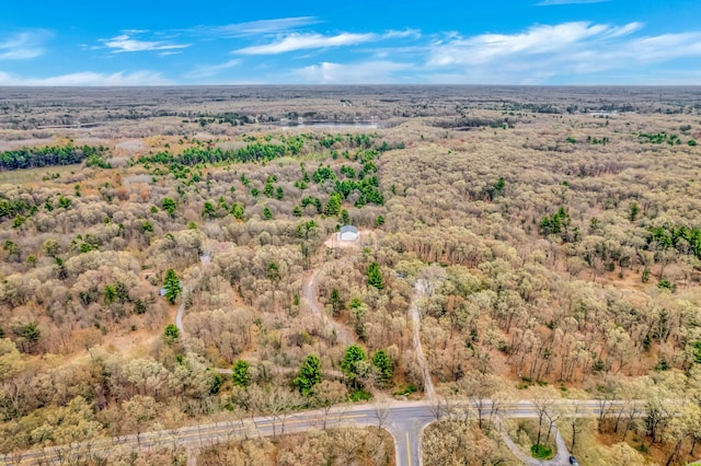 drone / aerial view of a heavily wooded area