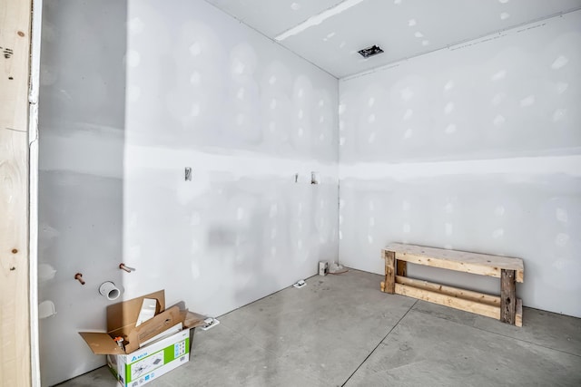 bathroom with concrete floors