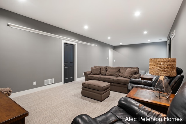 living area featuring recessed lighting, carpet, and baseboards