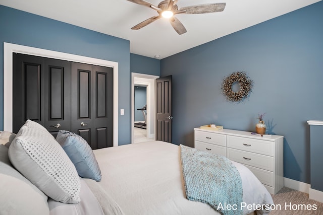bedroom with carpet flooring, baseboards, a ceiling fan, and a closet