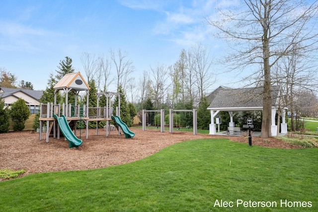 community playground featuring a lawn and a gazebo