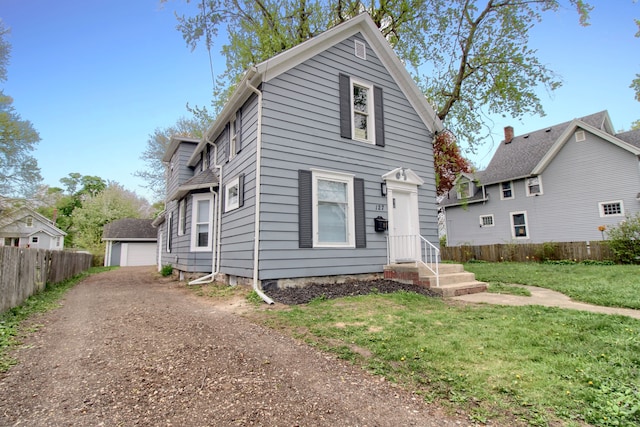 127 Bates St, Jackson, MI 49202 - view of front of home with a detached garage