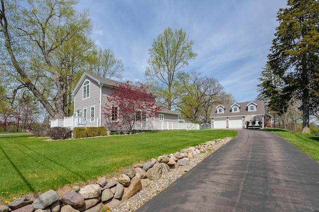 view of front facade featuring a garage and driveway