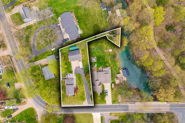 aerial view of residential area with property boundaries highlighted