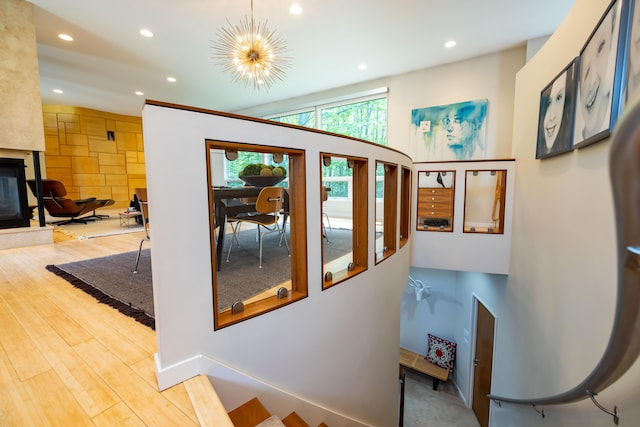 corridor featuring recessed lighting and wood finished floors