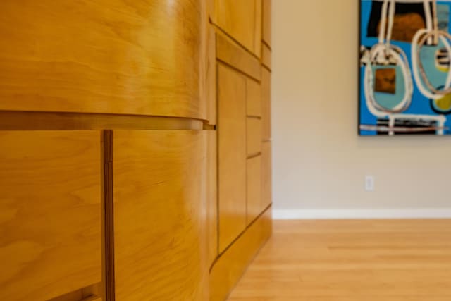 detailed view of wood finished floors and baseboards