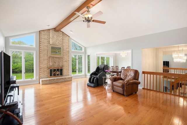 1204 Bradbury Dr, Troy, MI 48098 - living area featuring a chandelier, beamed ceiling, a ceiling fan, high vaulted ceiling, and light wood-style floors