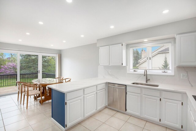 1204 Bradbury Dr, Troy, MI 48098 - kitchen featuring dishwasher, a sink, a peninsula, white cabinets, and recessed lighting
