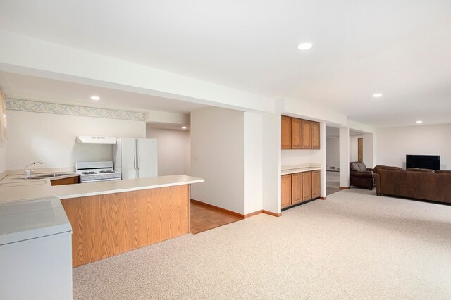 1204 Bradbury Dr, Troy, MI 48098 - kitchen with white appliances, light colored carpet, a sink, open floor plan, and light countertops