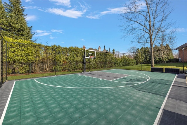 view of sport court with community basketball court and fence
