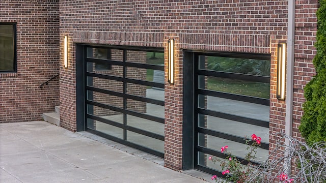 47490 Bellagio Dr, Northville, MI 48167 - doorway to property featuring brick siding