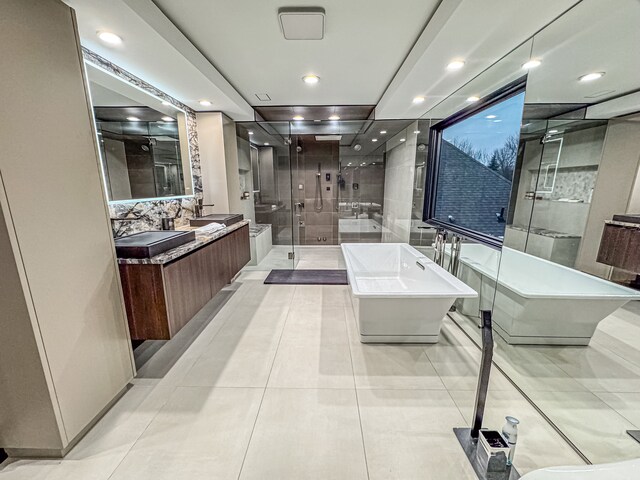 47490 Bellagio Dr, Northville, MI 48167 - full bathroom featuring a stall shower, tile patterned flooring, vanity, recessed lighting, and a soaking tub