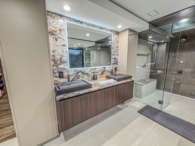 47490 Bellagio Dr, Northville, MI 48167 - full bath featuring a shower stall, vanity, and recessed lighting