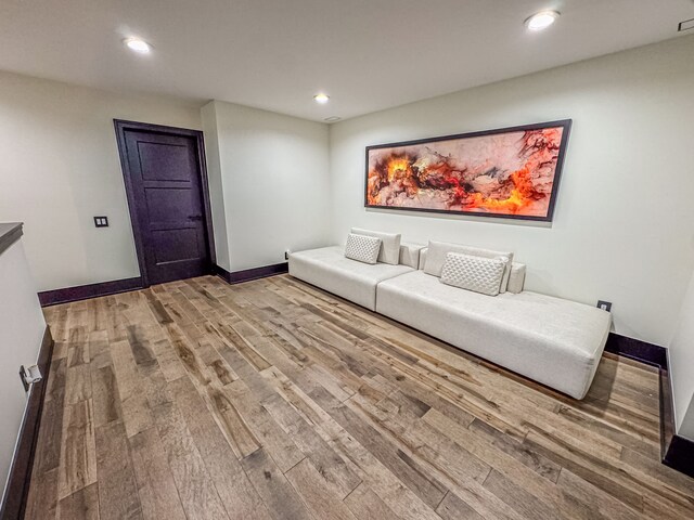 47490 Bellagio Dr, Northville, MI 48167 - living area featuring wood finished floors, recessed lighting, and baseboards