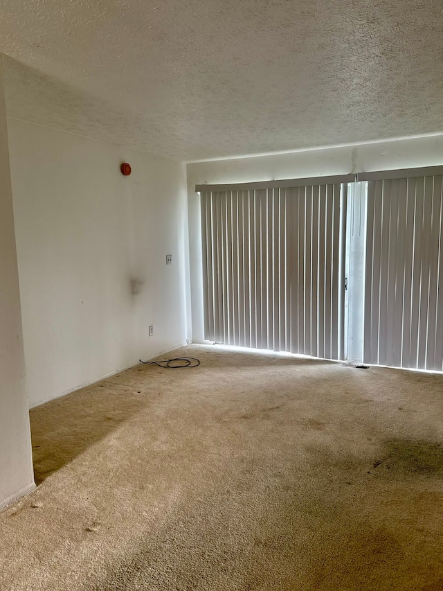 1349 Cherrylawn Dr, Pontiac, MI 48340 - carpeted spare room featuring a textured ceiling