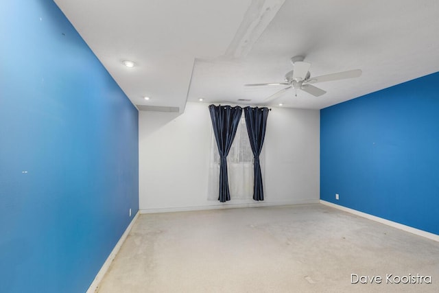 empty room featuring baseboards, a ceiling fan, carpet, and recessed lighting