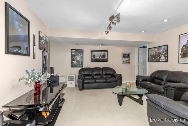 living area featuring carpet flooring and recessed lighting
