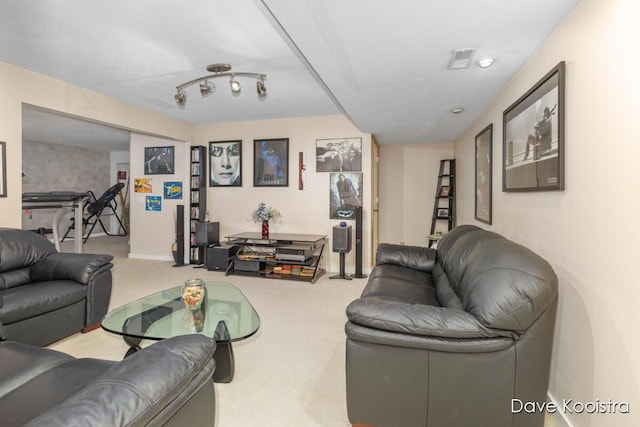 living area with carpet and baseboards