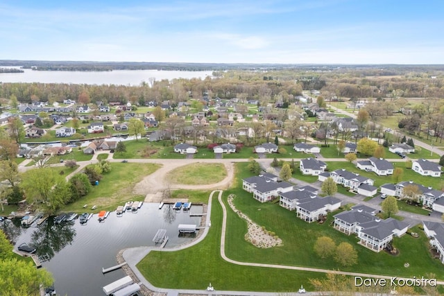 aerial perspective of suburban area featuring a large body of water