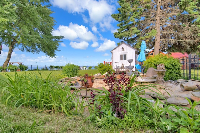 view of yard featuring fence