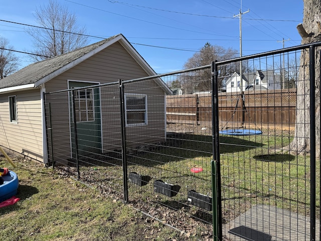 4235 Vine St, Brown City, MI 48416 - view of side of home with a fenced backyard and a shingled roof