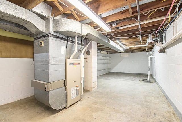 2228 Washington Ave, Saint Joseph, MI 49085 - unfinished basement featuring concrete block wall and drainage system