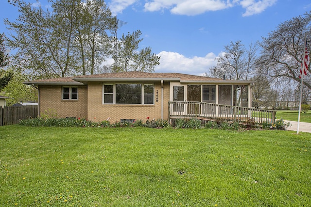 2228 Washington Ave, Saint Joseph, MI 49085 - view of front of house featuring brick siding and a sunroom
