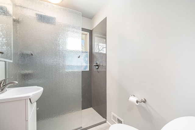 2228 Washington Ave, Saint Joseph, MI 49085 - bathroom with toilet, a walk in shower, and vanity