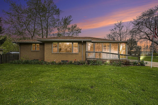 2228 Washington Ave, Saint Joseph, MI 49085 - back of house at dusk with brick siding