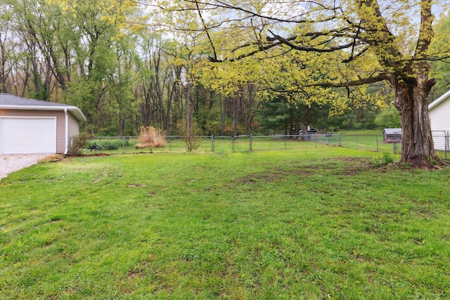 view of yard featuring a garage