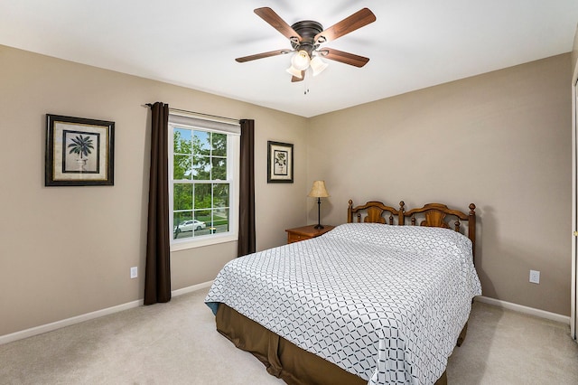 1079 Trailside Blvd, Wixom, MI 48393 - bedroom featuring light colored carpet, baseboards, and ceiling fan