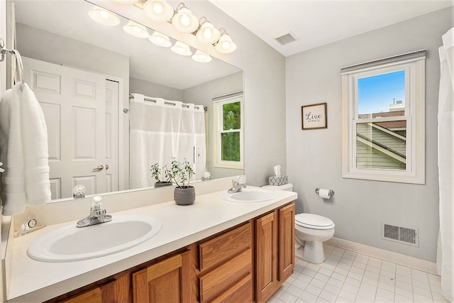 1079 Trailside Blvd, Wixom, MI 48393 - bathroom featuring baseboards, double vanity, toilet, tile patterned floors, and a shower with shower curtain