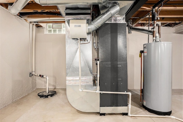 1079 Trailside Blvd, Wixom, MI 48393 - utility room with water heater, heating unit, and drainage system
