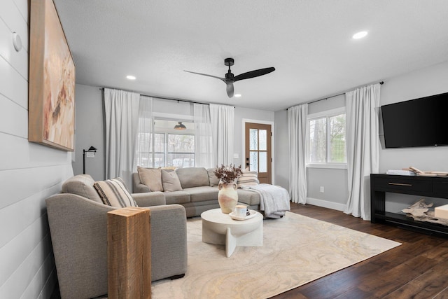 living room featuring ceiling fan, wood finished floors, and recessed lighting