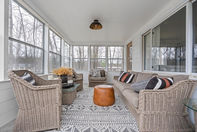 sunroom / solarium with an outdoor hangout area