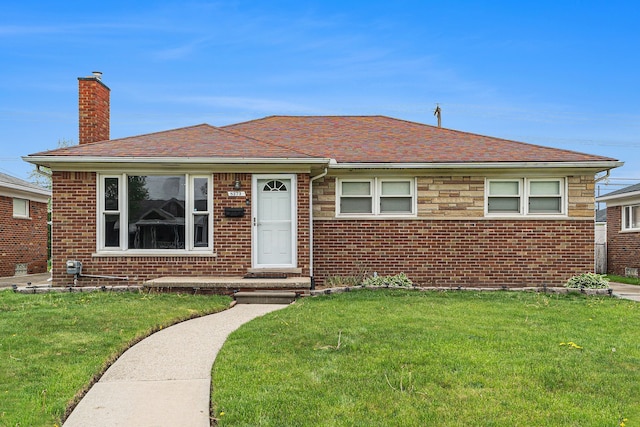 8373 Mckinley, Center Line, MI 48015 - view of front facade with a chimney, a front yard, and brick siding