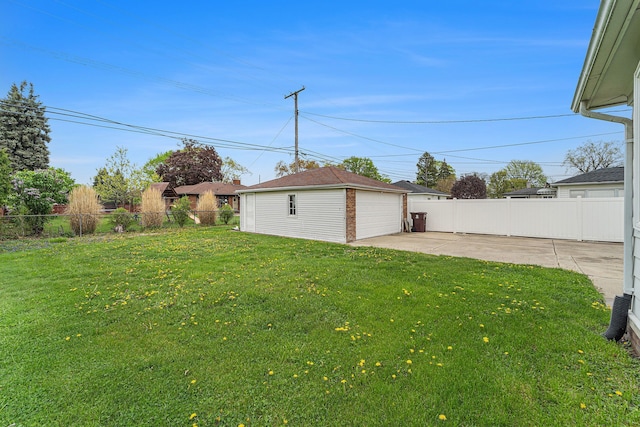 8373 Mckinley, Center Line, MI 48015 - view of yard with a detached garage, an outdoor structure, and a patio