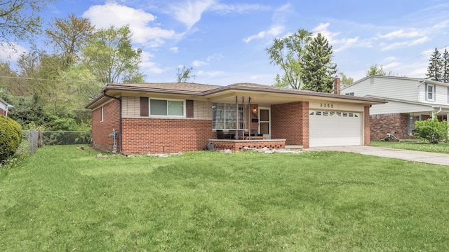 view of front facade featuring brick siding, a garage, and driveway
