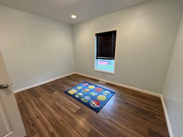 205 Wren Rd, Sturgis, MI 49091 - unfurnished room with wood finished floors, baseboards, and recessed lighting