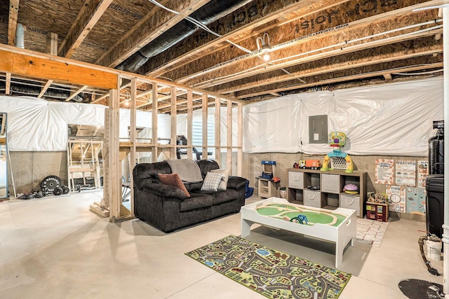 unfinished basement featuring electric panel