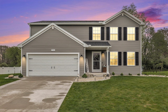 traditional-style house featuring concrete driveway, a garage, and roof with shingles