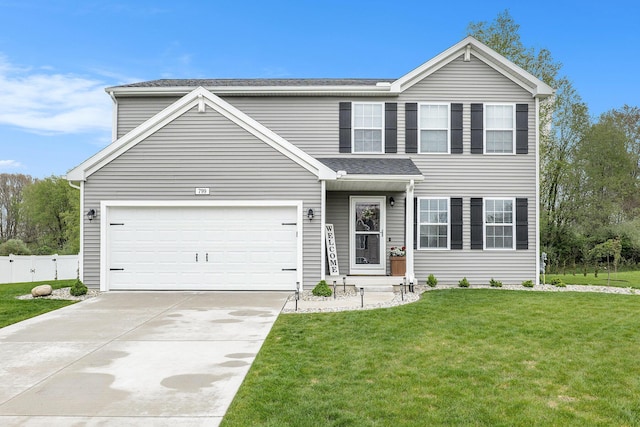traditional-style home with concrete driveway, a garage, and roof with shingles